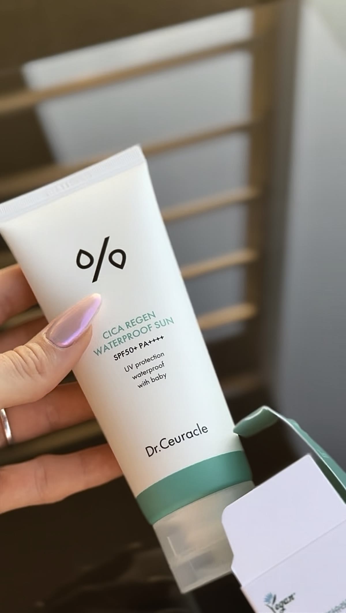 Sunscreen product in hand