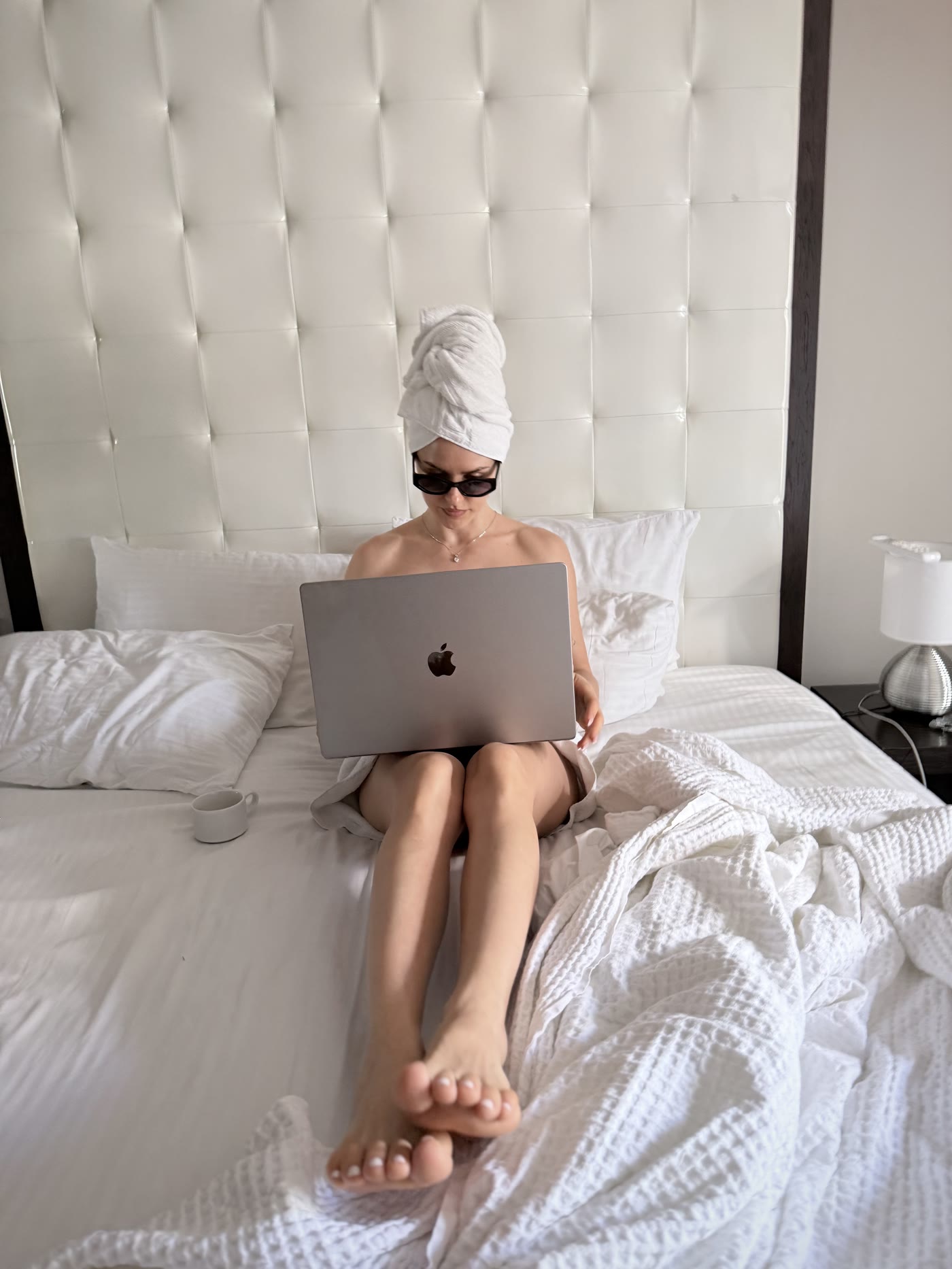 Working from the hotel bed